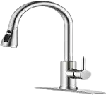 Chrome spray faucet installed on a modern kitchen sink with flexible pull-down sprayer